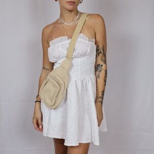 White Strapless Dress with Beige Crossbody Bag and pearl hair tie
